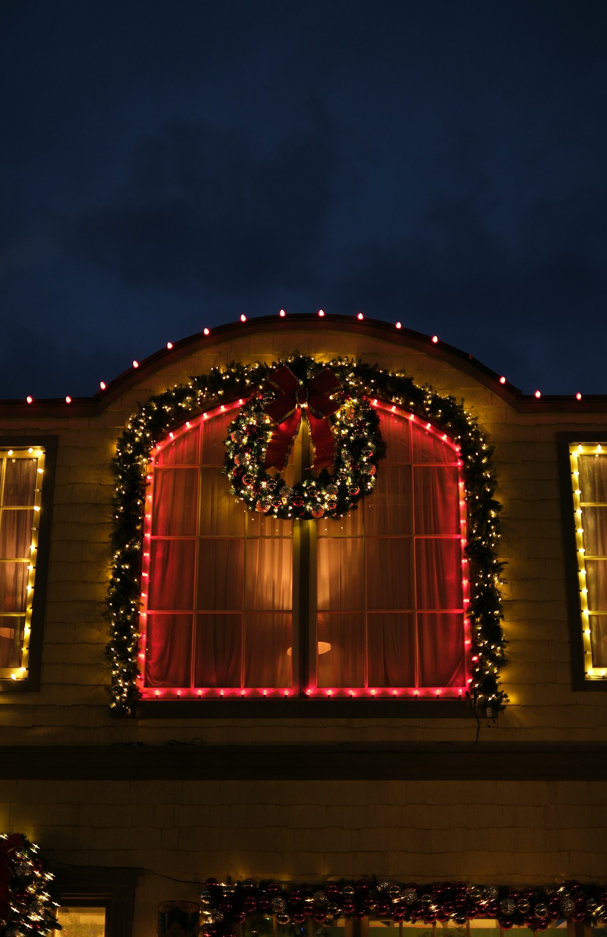 Wreath and facade holiday lighting by MerryGlow